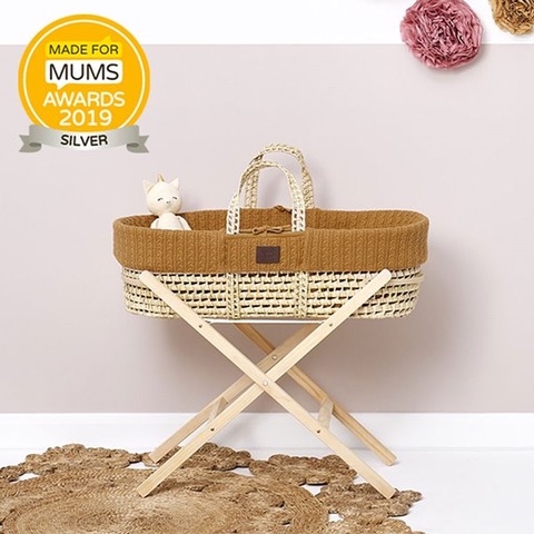 little green sheep moses basket with a natural mattress in honey color